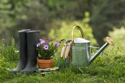 Team managing landscaping tasks with safety controls in place